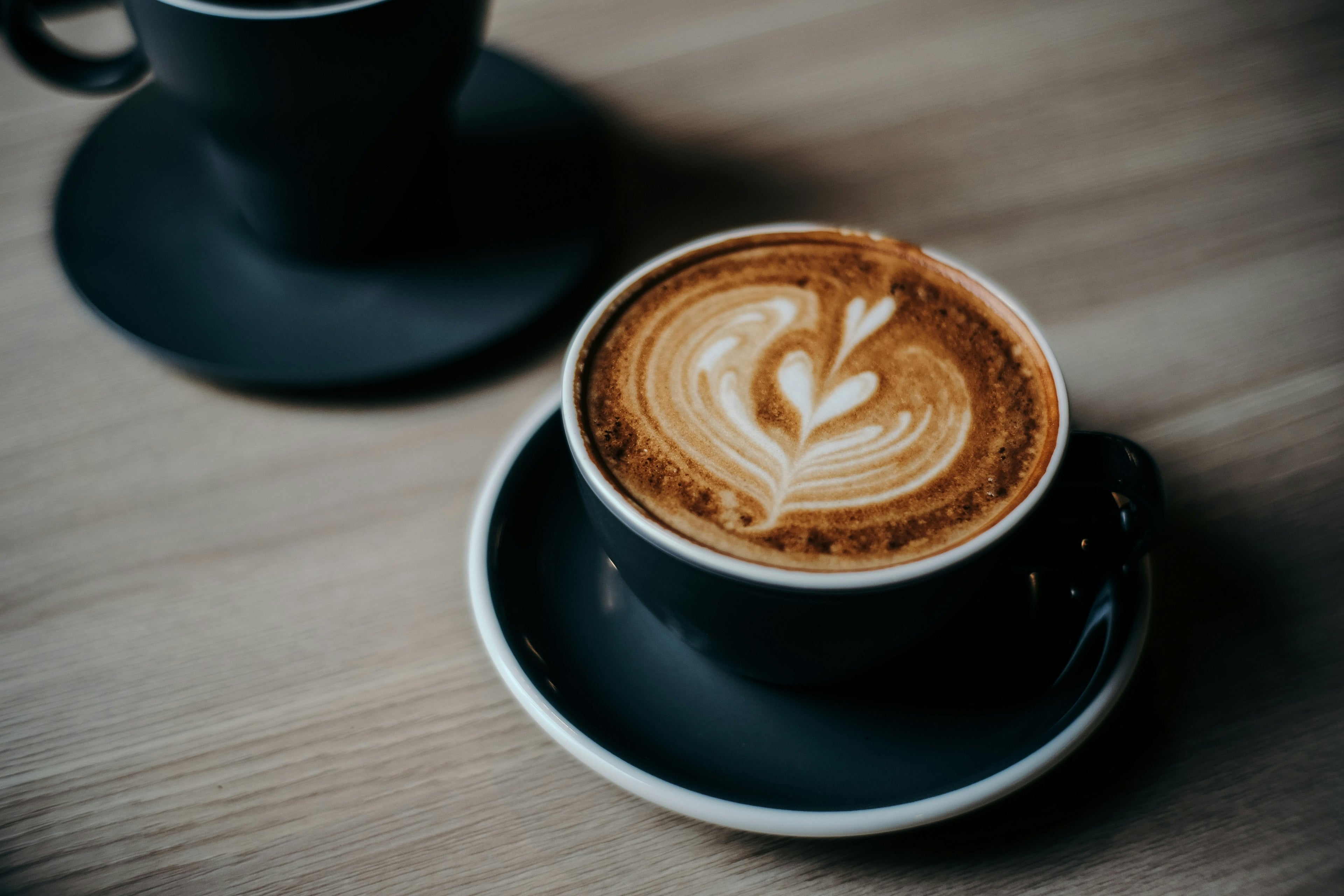 Espresso coffee on wooden table