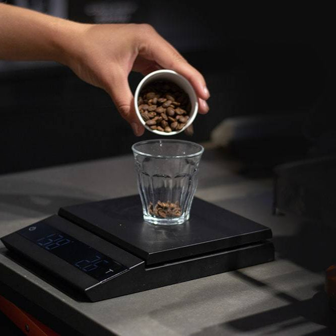 The Felicita Parallel Coffee Scale  Product Shown With Coffee Being Weighed