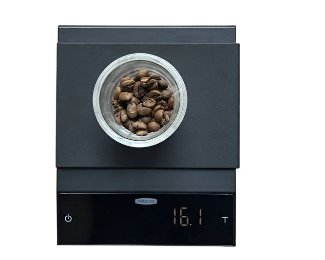Felicita Incline Coffee Scale Product Colour Black Product Overhead View Showing Coffee Being Weighed 